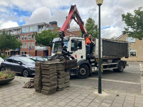 Foto van de tegeltaxi aan het werk